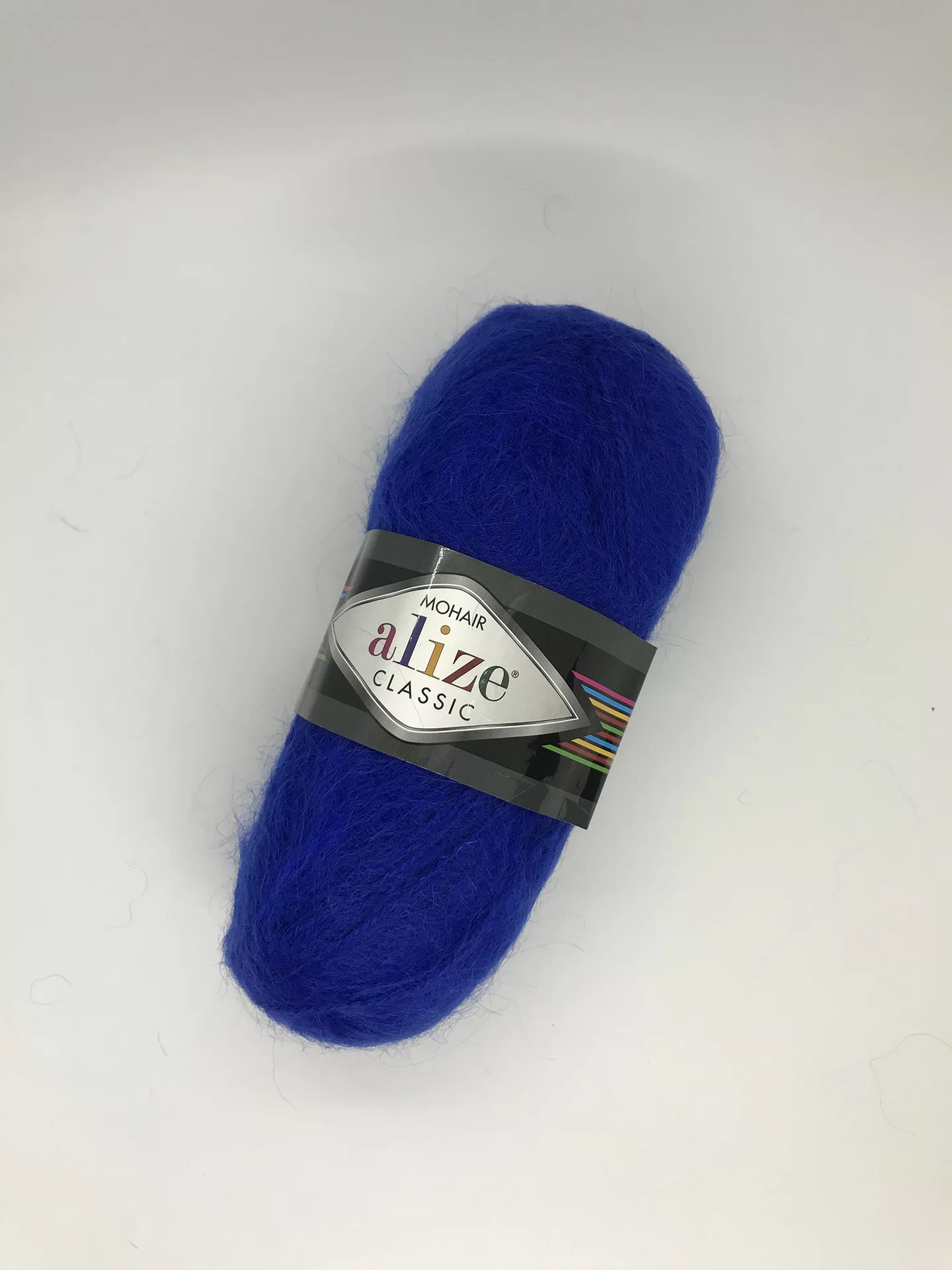 На фото Пряжа Alize Mohair Classic цвет 141